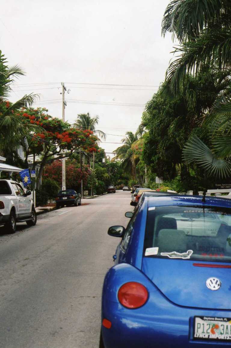 FloridaKeysTripKeyWStreetLuckyParkedOnRightJune2005355PMSykes